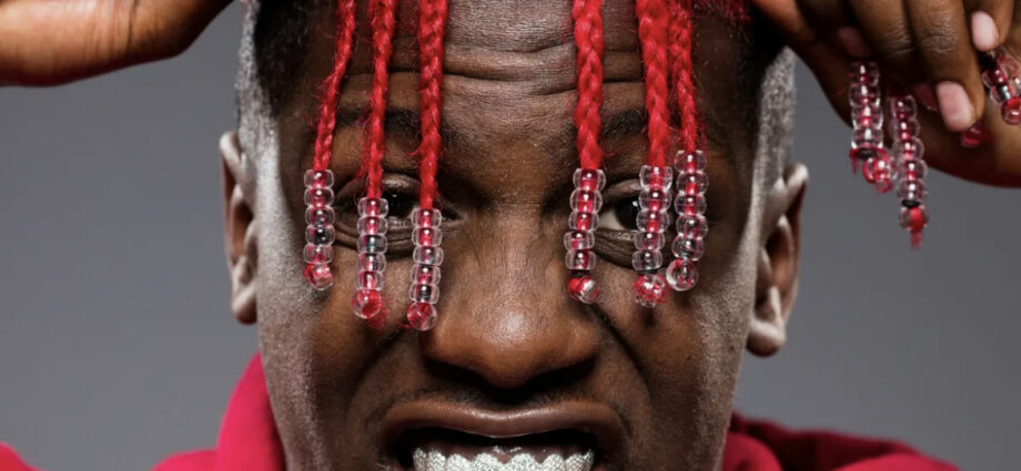 Lil Yachty's portrait with red hair.