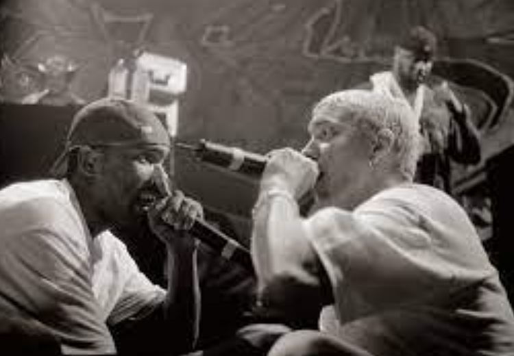 Two men singing Freestyle Rap