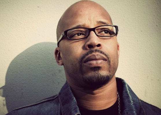 A close-up look of Warren G American rapper in black glasses