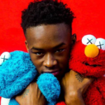 Rapper Rico Cartel with toys